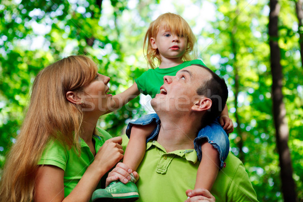 Portrait of a funny family having fun Stock photo © luckyraccoon