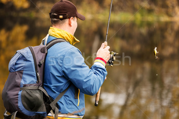 Fisherman with spinning. Stock photo © luckyraccoon