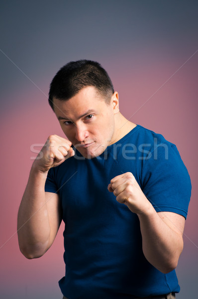 Foto jonge man permanente boksen positie man Stockfoto © luckyraccoon