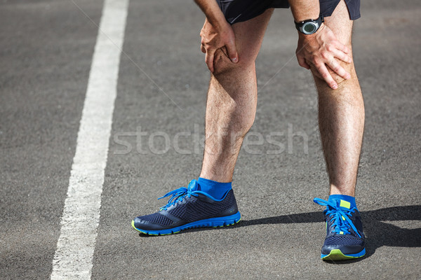 Cansado masculina corredor formación carretera Foto stock © luckyraccoon