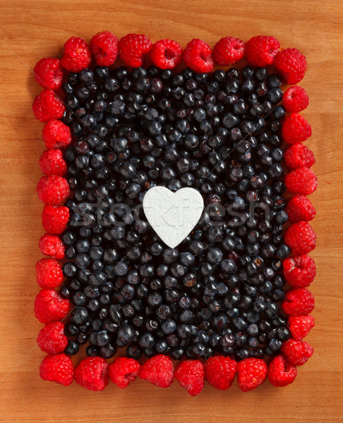 Colorful border frame made of berries Stock photo © luckyraccoon