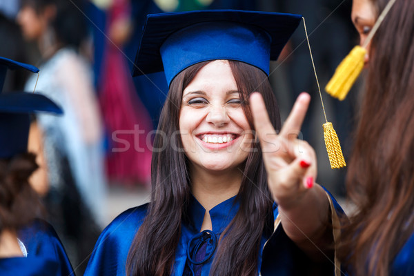 Image of a happy young graduate  Stock photo © luckyraccoon