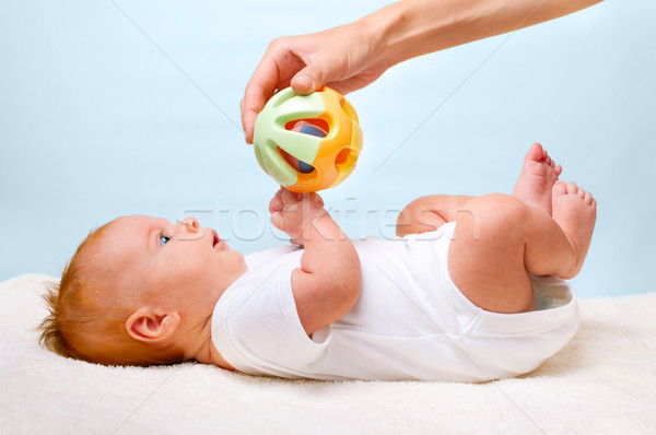 小 鋪設 嬰兒 玩具 女孩 面對 商業照片 © luckyraccoon