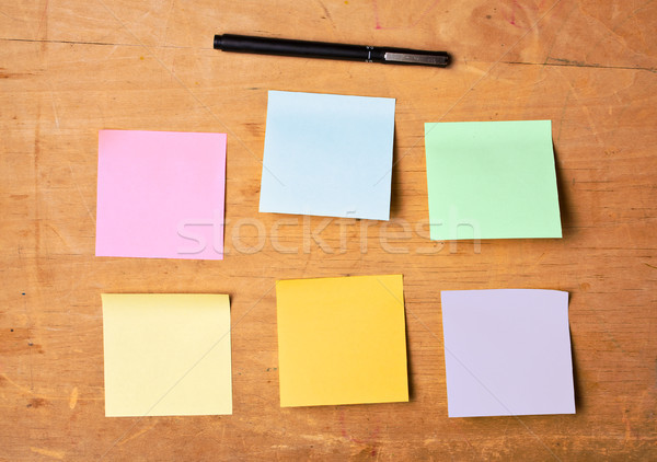 sticky noted with black pen on wooden board Stock photo © luckyraccoon