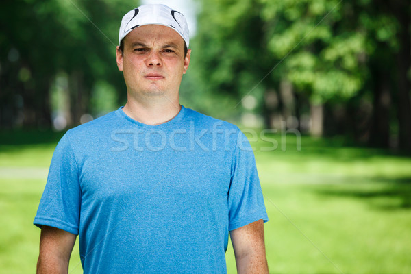 Fitness instructeur extérieur portrait herbe golf Photo stock © luckyraccoon