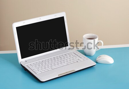 White laptop on table - place for text. Stock photo © luckyraccoon