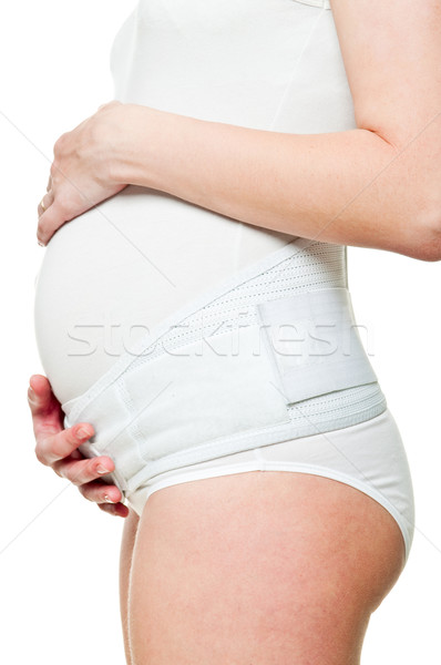 Jeunes femme enceinte corset femme heureux [[stock_photo]] © luckyraccoon