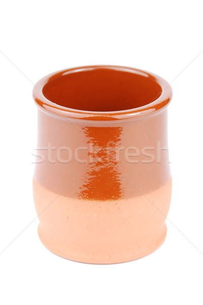 Vibrant orange ceramic planting pot on white Stock photo © luissantos84
