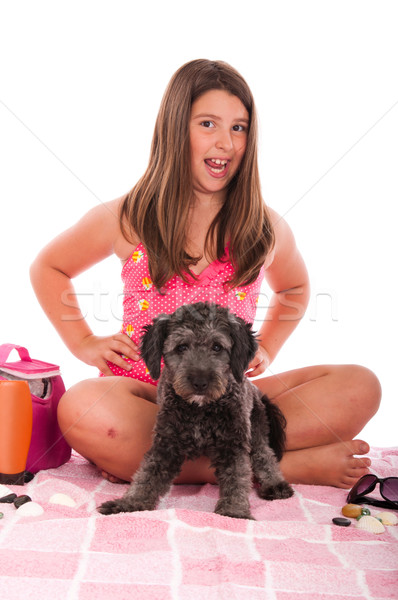 Lány fürdőruha tengerpart kutya mosolyog barna hajú Stock fotó © luissantos84