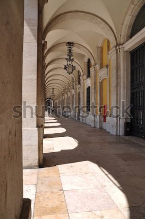 Commerce square arcades in Lisbon Stock photo © luissantos84