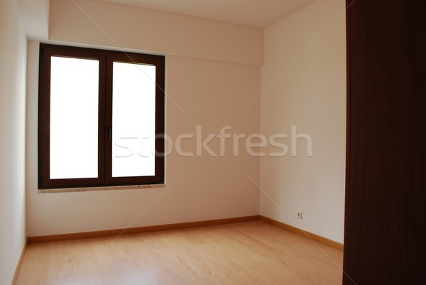 Empty and clean room with wooden floor Stock photo © luissantos84