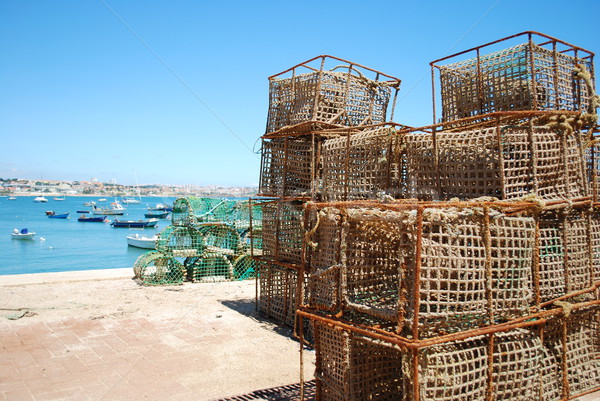 Old fishing cages in the port of Cascais, Portugal Stock photo © luissantos84