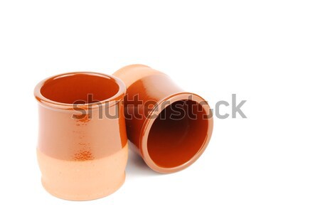 Vibrant orange ceramic planting pots on white Stock photo © luissantos84