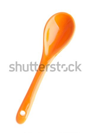 Porcellana cucchiaio arancione isolato bianco alimentare Foto d'archivio © luissantos84