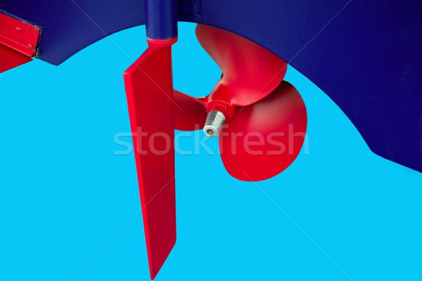 Boat red paint propeler helix in blue hull boat Stock photo © lunamarina