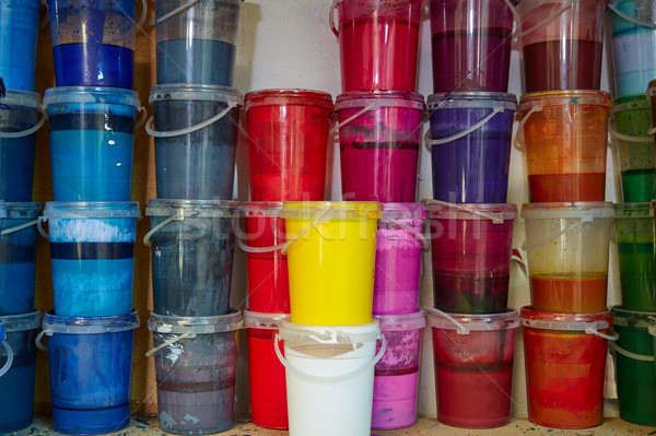 Colorful ink paint bottles in a row stacked Stock photo © lunamarina