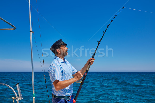 Foto stock: Barba · marinheiro · homem · vara · de · pesca · corrico