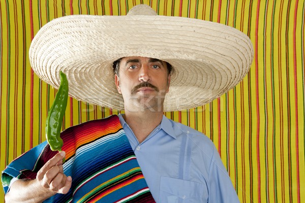 Chili hot pepper Mexican man typical poncho serape Stock photo © lunamarina