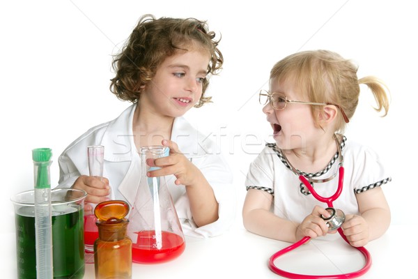 Girls pretending to be doctor in laboratory Stock photo © lunamarina