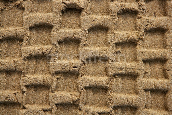 Beach sand texture with vehicle tires footprint Stock photo © lunamarina
