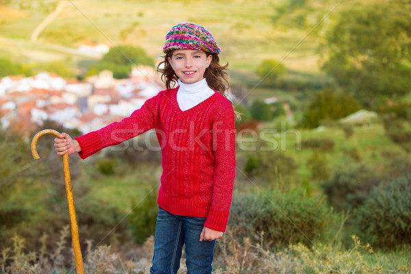 Kid girl shepherdess with wooden baston in Spain village Stock photo © lunamarina