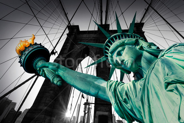 Liberty Statue and Brooklyn bridge New York Stock photo © lunamarina