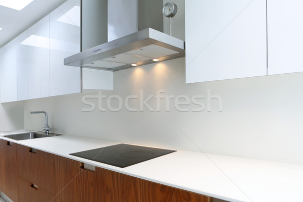 Actual modern kitchen in white and walnut wood Stock photo © lunamarina