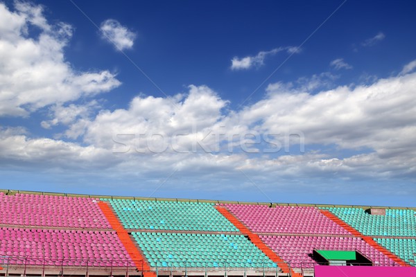 stadium colorful grandstand stands blue sky Stock photo © lunamarina