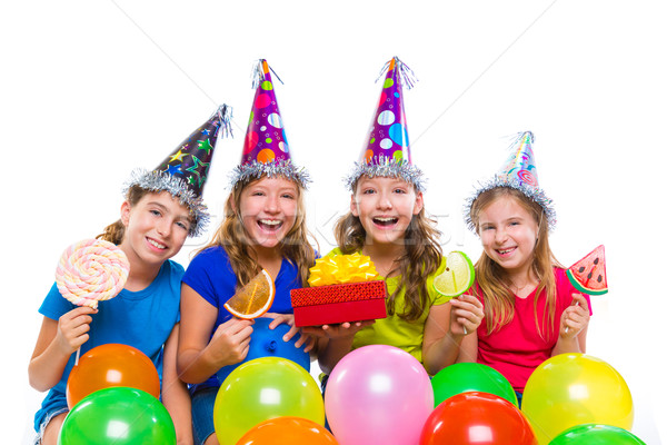 Happy kid girls birthday party balloons candy Stock photo © lunamarina