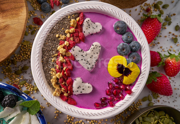 Acai bowl smoothie pitaya hearts blueberry goji Stock photo © lunamarina