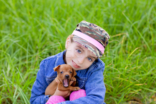 little girl with pet puppy mascot mini pinscher Stock photo © lunamarina