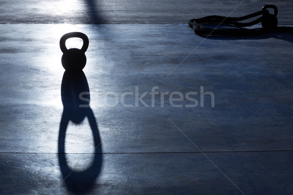 Crossfit kettlebells ağırlık arka ışık gölge spor salonu Stok fotoğraf © lunamarina