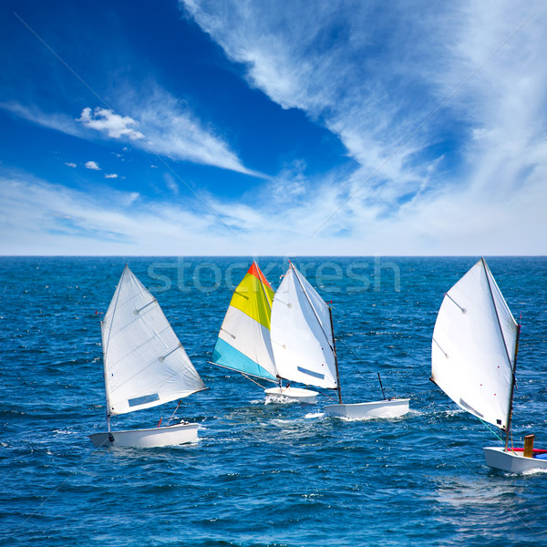 Sailboats Optimist learning to sail in Mediterranean at Denia Stock photo © lunamarina