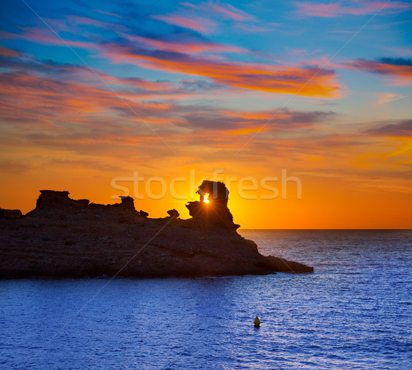 Menorca sunset in Cala Morell at Ses torretes beach Stock photo © lunamarina