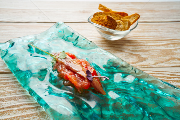 Anchovies on fresh grated tomato tapas Stock photo © lunamarina