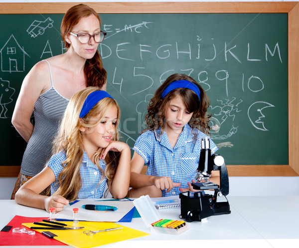 Stock photo: kids students with nerd teacher woman at school