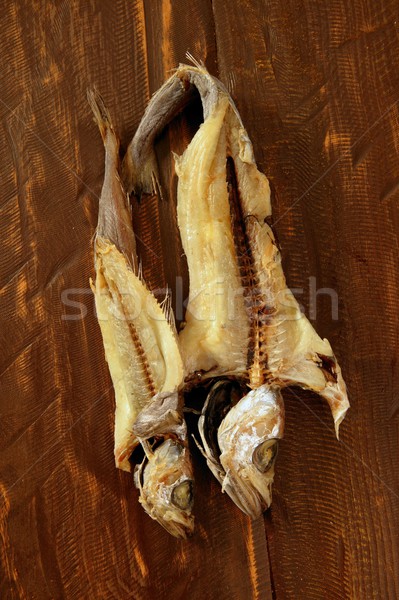 dried hake fish over wood Stock photo © lunamarina