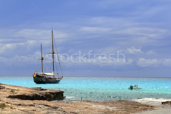 pirates inspired wood sailboat anchored turquoise Stock photo © lunamarina