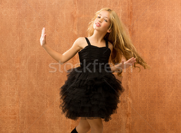 black dress kid girl dancing and twisting vintage Stock photo © lunamarina