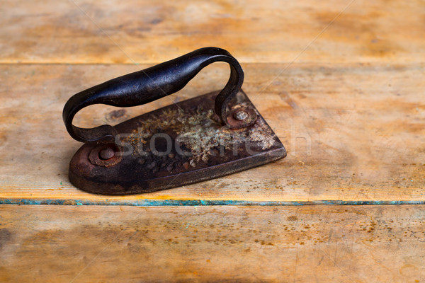 Aged vintage clothes iron in rusted metal Stock photo © lunamarina