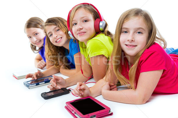 Stock photo: sisters kid girls tech tablets and smatphones