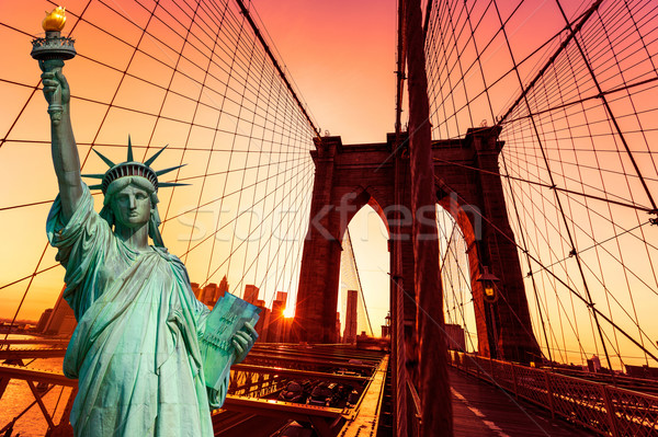 Liberty Statue and Brooklyn bridge New York Stock photo © lunamarina