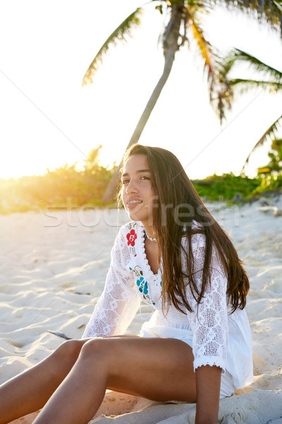 Latin beautiful girl sunset in Caribbean beach Stock photo © lunamarina