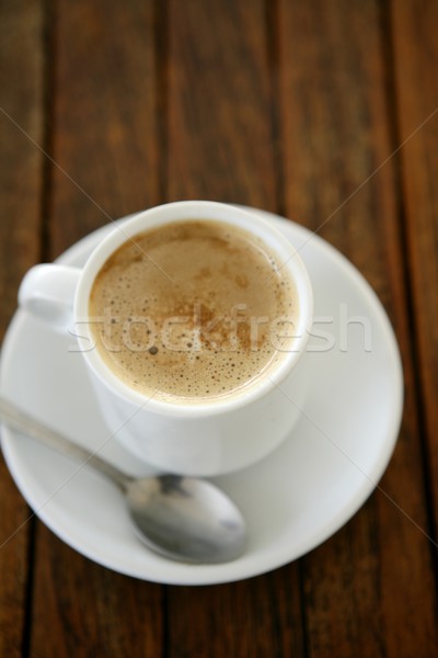 Coffe with milk white cup over teak wooden Stock photo © lunamarina