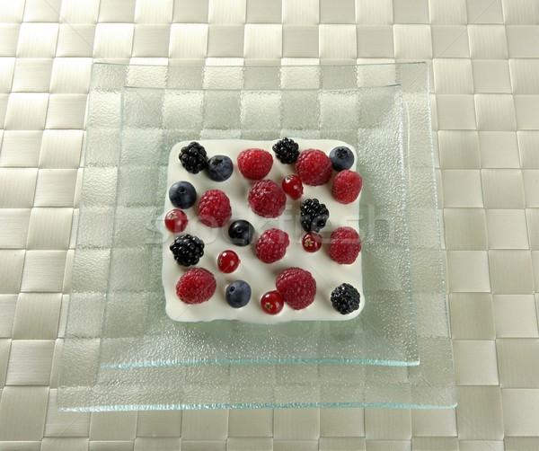 Mix of varied berries and cream Stock photo © lunamarina