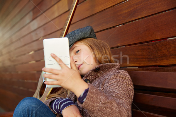 blond kid girl taking selfie guitar and winter beret Stock photo © lunamarina