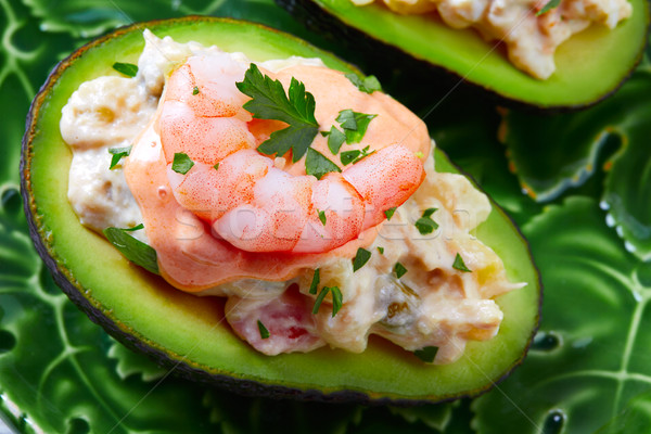 Seafood filled avocado with shrimps tapas pinchos Stock photo © lunamarina