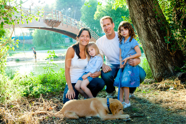 Family father mother kids and dog outdoor Stock photo © lunamarina