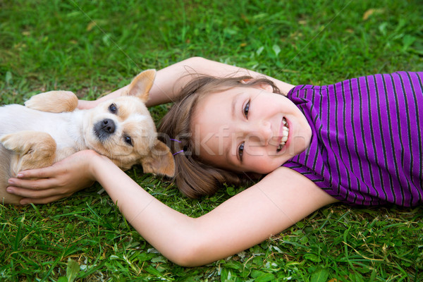 Crianças menina jogar cão gramado quintal Foto stock © lunamarina