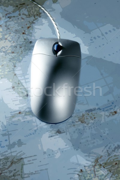 Computer silver wired mouse over blue  map Stock photo © lunamarina